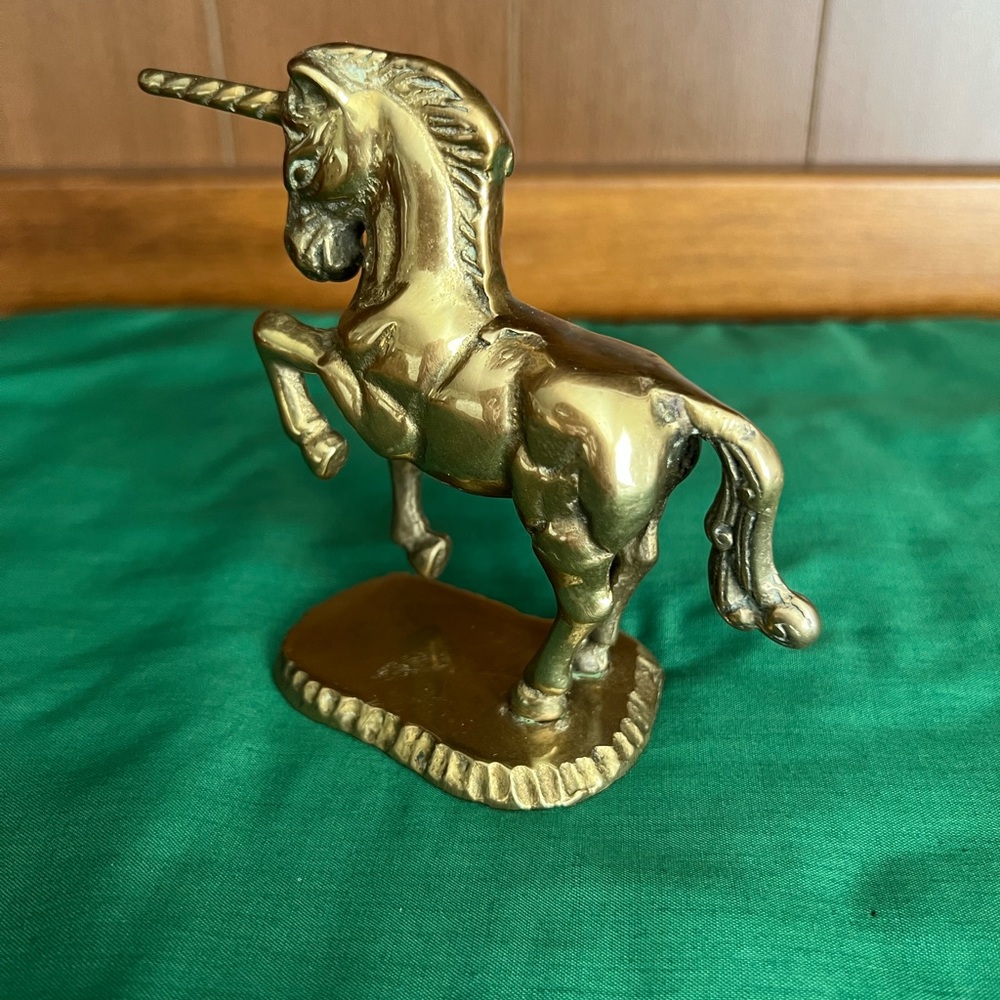 Brass Unicorn Figurine on base.